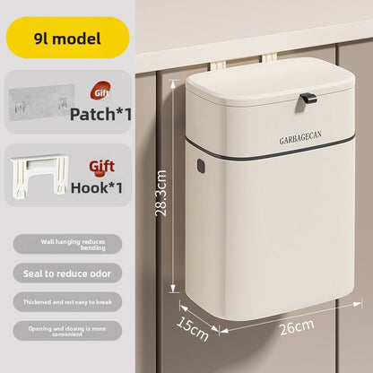 Wall-mounted trash can in the kitchen